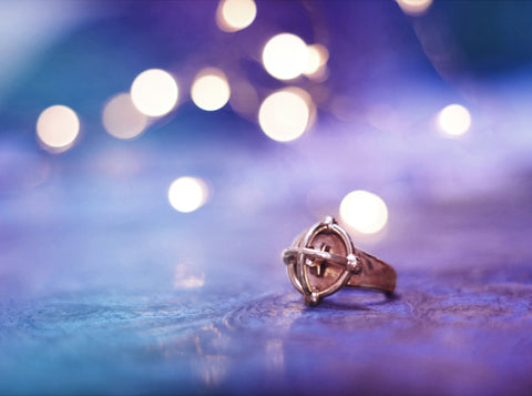 witchy brass signet ring with a caged dome and star